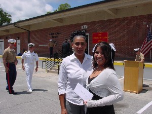 In June, Mrs. Valdez (l), mother of Cpl. Ramona Valdez, congratulates Nikita Apreisnig, this year's winner of the Cpl. Ramona Valdez Memorial Scholarship. 